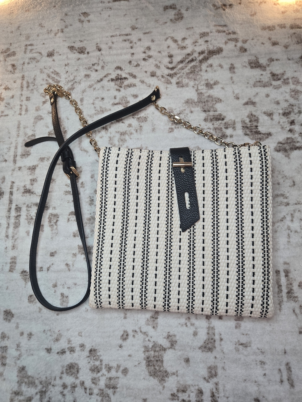 Thacker Stripped Black & White Woven Cotton Crossbody Bag with Gold Chain Accent